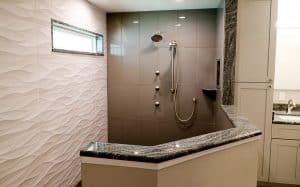 Luxury walk-in bathroom shower remodel with custom tile in Hobe Sound Florida