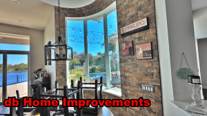 Custom curved architectural impact window and sliding patio doors
