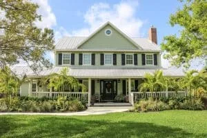 Integrated PGT impact windows entry doors and James Hardie siding installation